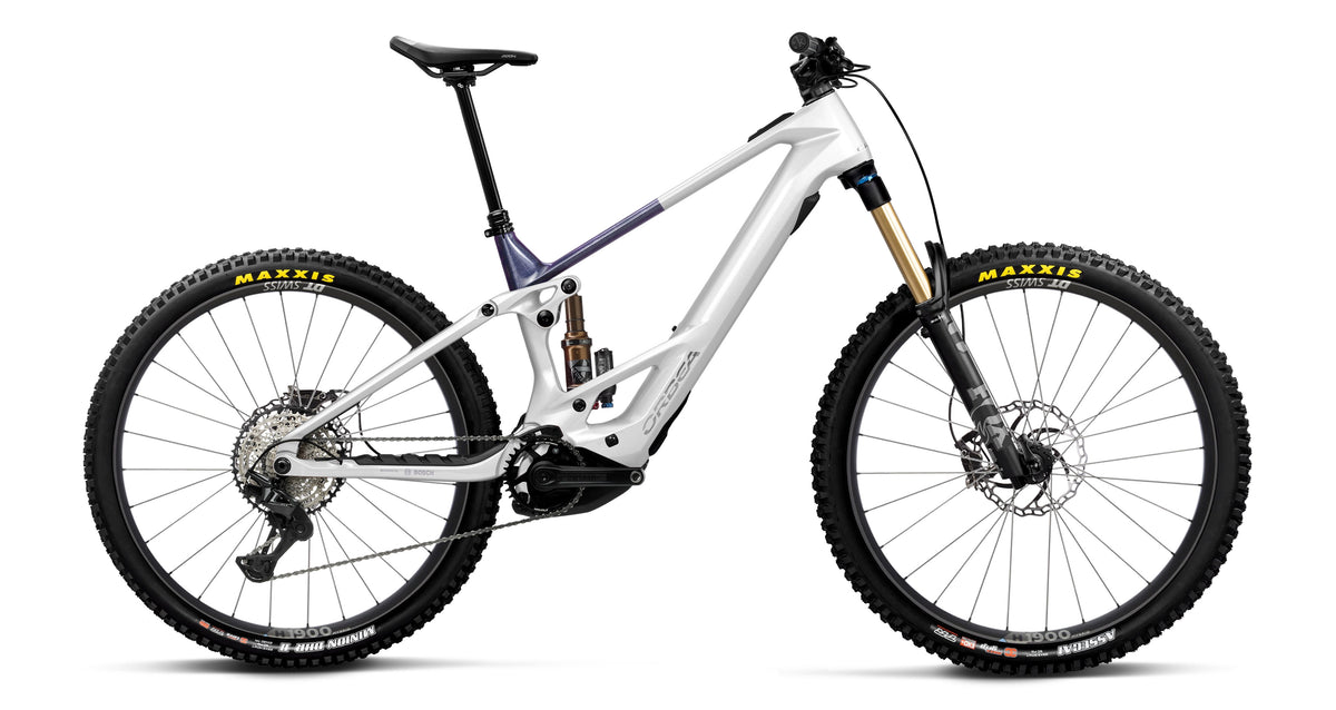 Orbea Wild TR M10 carbon electric mountain bike in White Chic - Tanzanite, side profile